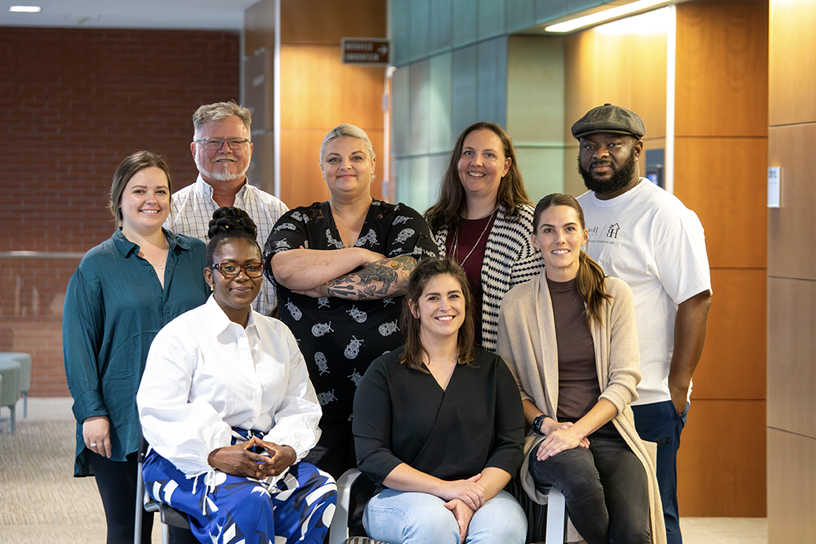 Class 1 of Applied Leadership Academy showing eight people split up into two rows.