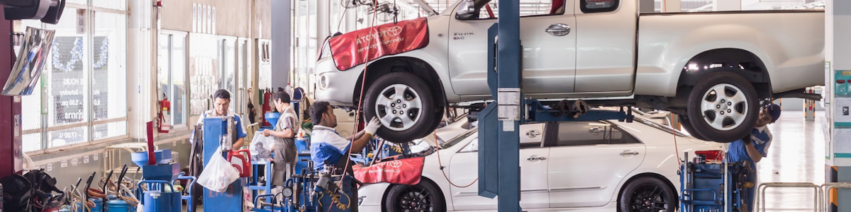 T-Ten students working on a Toyota pickup truck